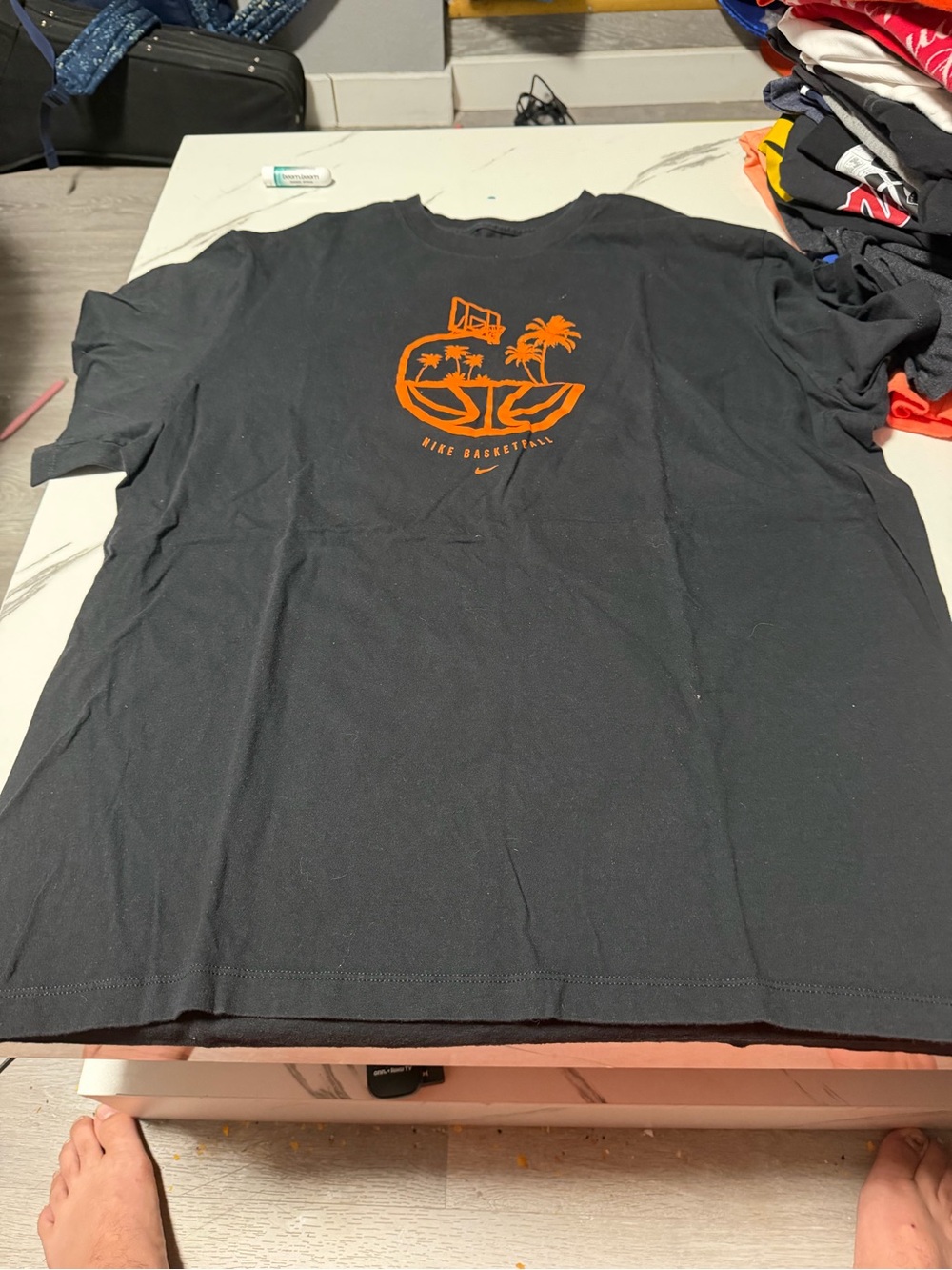 Nike Black Short-Sleeve Tee with Orange Basketball Graphic